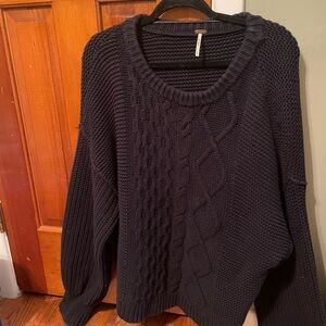 Free people black cable knit sweater.. size xl for an oversized fit